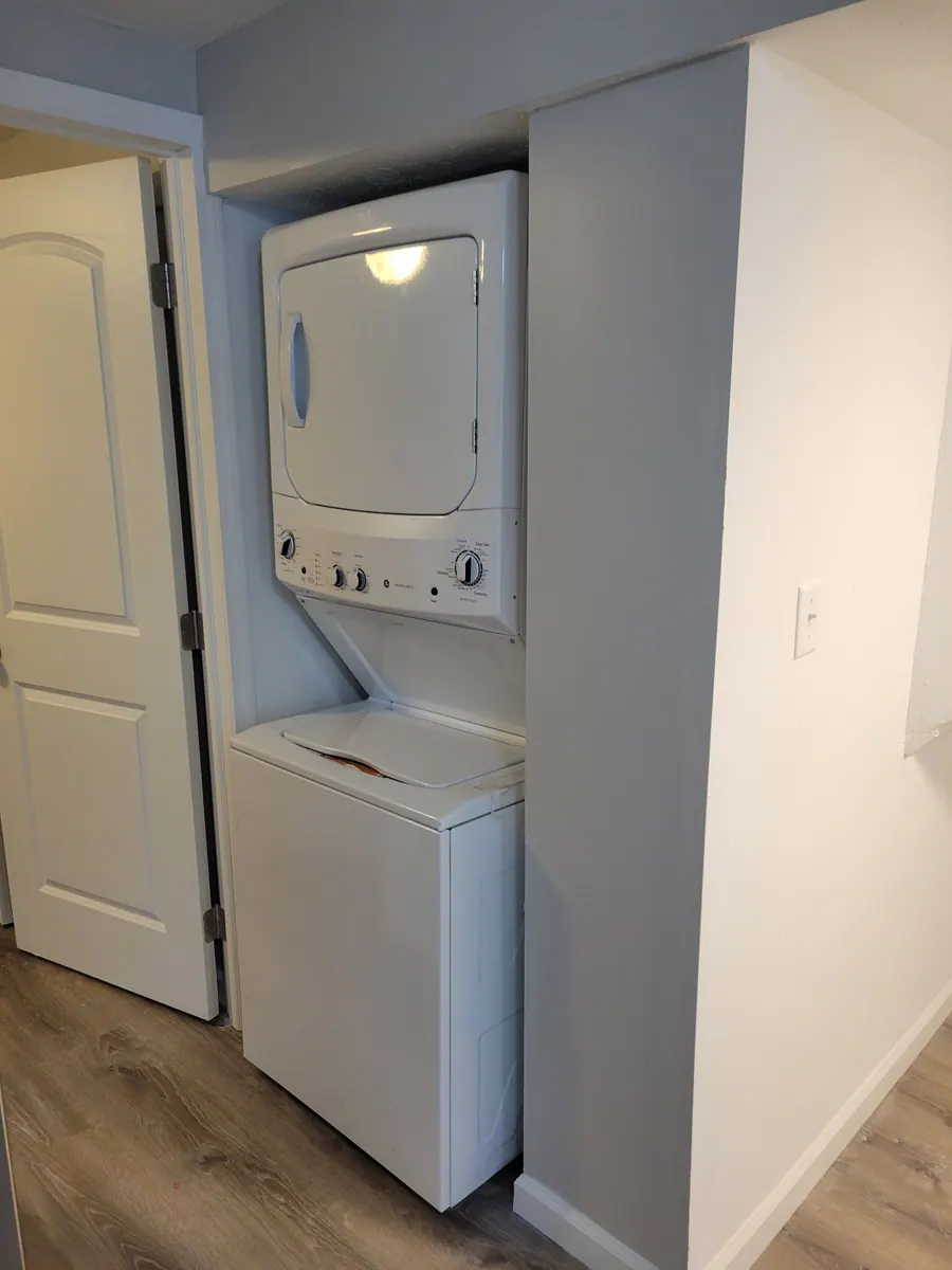 Stacked washer and dryer in a two-bedroom unit